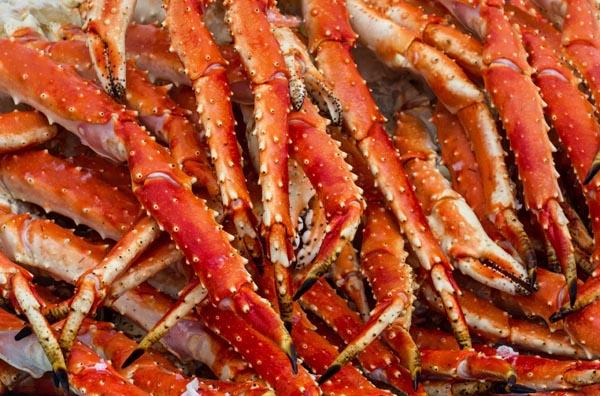 Colossal King Crab legs caught wild and fresh in Alaska.